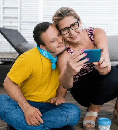 mother and son looking at tablet